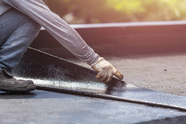 Professional Waterproofing technician working in Mayville, WI